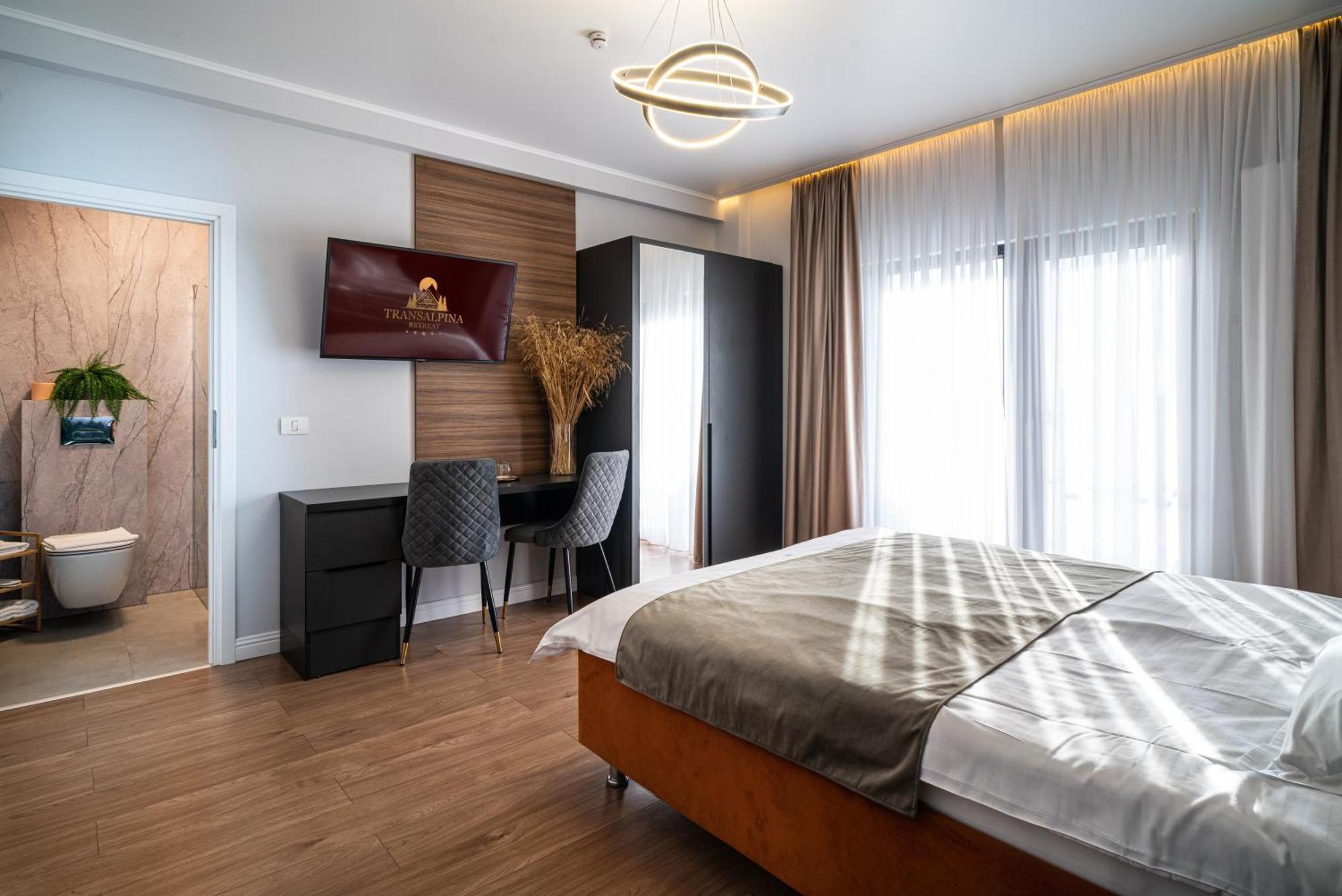 Hotel Transalpina Retreat Novaci-Străini Esterno foto
