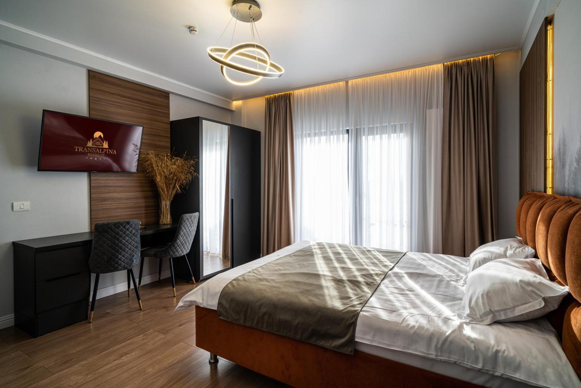 Hotel Transalpina Retreat Novaci-Străini Esterno foto